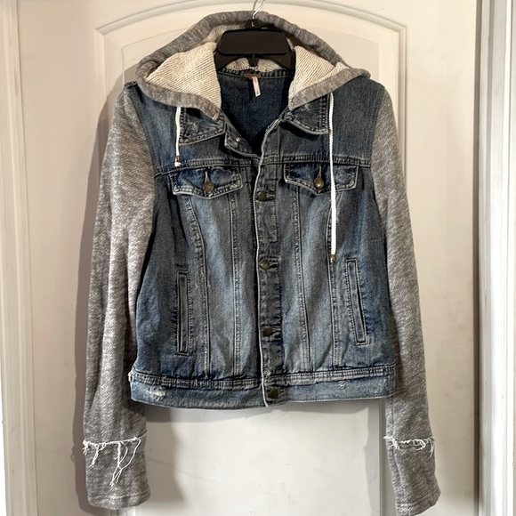 Free People Distressed Denim Jacket with Gray Knit Sleeves and Detachable Hood